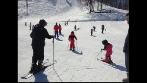 First family private lesson for our beginner-level skiiers - P, T and Nanny.